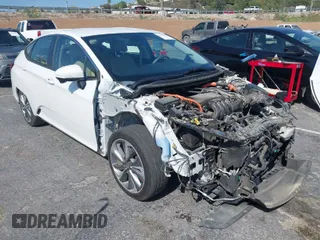 2019 Honda Clarity Plug-In Hybrid with VIN JHMZC5F15KC004170, listed as a IAAI auction lot 41976479 with 125,545 mi miles. Bid and sale history available at carsss.com. Image 1.