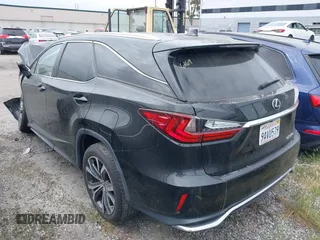 2022 Lexus RX with VIN JTJHZKFA8N2038704, listed as a IAAI auction lot 41892583 with 35,565 mi miles. Bid and sale history available at carsss.com. Image 3.