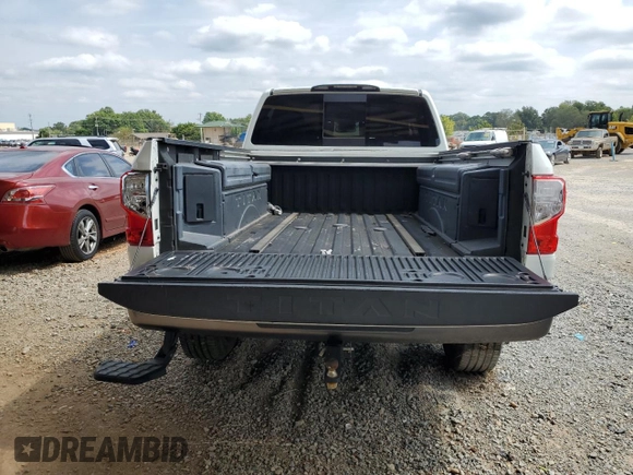 2018 Nissan Titan Platinum Reserve with VIN 1N6BA1F49JN521225, listed as a Copart auction lot 69831004 with 92,536 mi miles and Salvage title. Bid and sale history available at DreamBid. Image 6.