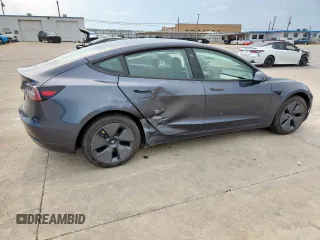 2023 Tesla Model 3 with VIN 5YJ3E1EA1PF468627, listed as a Copart auction lot 57285575 with 5,952 mi miles and Salvage title. Bid and sale history available at DreamBid. Image 3.