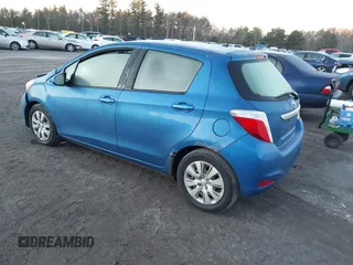 2012 Toyota Yaris L with VIN JTDKTUD37CD539286, listed as a IAAI auction lot 41219674 with 59,292 mi miles. Bid and sale history available at carsss.com. Image 3.
