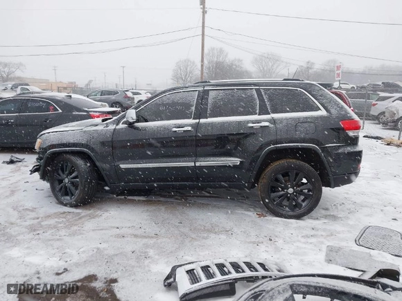 2013 Jeep Grand Cherokee Limited with VIN 1C4RJFBT4DC567444, listed as a IAAI auction lot 41300410 with 121,665 mi miles. Bid and sale history available at carsss.com. Image 15.