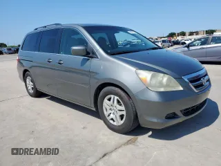 2007 Honda Odyssey EX with VIN 5FNRL38437B068697, listed as a Copart auction lot 60875505 with 211,688 mi miles and Salvage title. Bid and sale history available at DreamBid. Image 4.