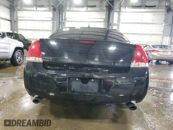 2014 Chevrolet Impala LT with VIN 2G1WB5E3XE1105184, listed as a Copart auction lot 82112844 with 289,783 mi miles and Salvage Title. Bid and sale history available at DreamBid. Image 6.