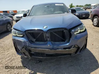 2023 BMW X4 M40i z VIN 5UX43DT00P9P32175, wystawiony jako Copart lot #51760625 z przebiegiem 17 620 mil mil oraz Szkoda całkowita • Salvage title. Historia ofert i sprzedaży dostępna na DreamBid. Obrazek 5.