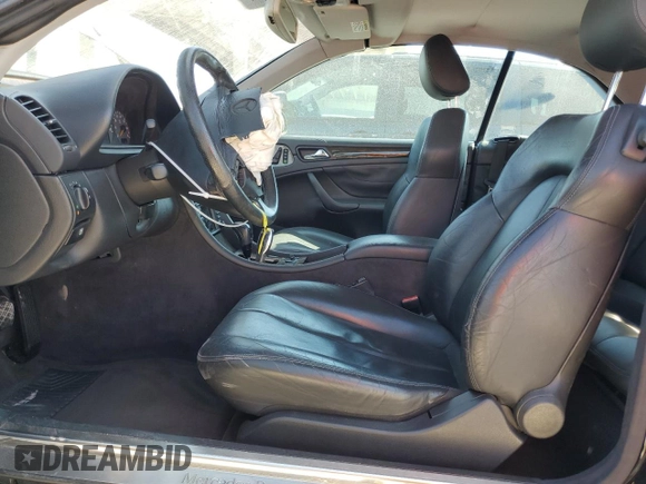 2002 Mercedes-Benz CLK 55 AMG with VIN WDBLK74GX2T093407, listed as a Copart auction lot 42974935 with 123,941 mi miles and Salvage Title. Bid and sale history available at DreamBid. Image 7.