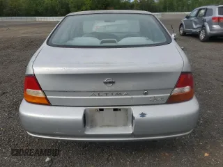 1999 Nissan Altima XE z VIN 1N4DL01D1XC202466, wystawiony jako Copart lot #54548015 z przebiegiem 131 409 mil mil oraz Szkoda całkowita • Salvage title. Historia ofert i sprzedaży dostępna na DreamBid. Obrazek 6.