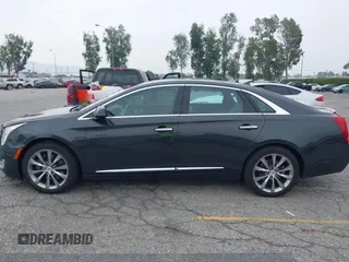 2013 Cadillac XTS Luxury with VIN 2G61P5S33D9215214, listed as a IAAI auction lot 42170402 with 132,045 mi miles and . Bid and sale history available at DreamBid. Image 14.