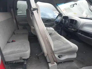 1999 Ford F-150 z VIN 1FTRX17WXXNA90516, wystawiony jako IAAI lot #41787426 z przebiegiem 354 066 mil mil oraz . Historia ofert i sprzedaży dostępna na DreamBid. Obrazek 8.