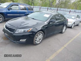 2014 Kia Optima EX with VIN 5XXGN4A7XEG300394, listed as a IAAI auction lot 42117331 with 139,986 mi miles and . Bid and sale history available at carsss.com. Image 2.
