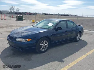 2003 Pontiac Grand Prix GT with VIN 1G2WP52K53F148801, listed as a IAAI auction lot 41888412 with 135,142 mi miles. Bid and sale history available at carsss.com. Image 2.