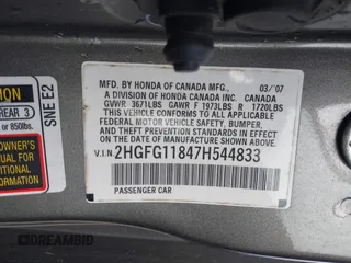 2007 Honda Civic Cpe EX with VIN 2HGFG11847H544833, listed as a IAAI auction lot 42002703 with 191,383 mi miles. Bid and sale history available at carsss.com. Image 9.