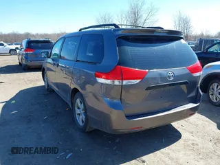 2011 Toyota Sienna with VIN 5TDZK3DC6BS125737, listed as a IAAI auction lot 41815233 with 248,318 mi miles. Bid and sale history available at carsss.com. Image 3.