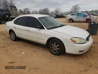2004 Ford Taurus z VIN 1FAFP52214A194125, wystawiony jako Copart lot #43234295 z przebiegiem 216 877 mil mil oraz Szkody całkowita. Historia ofert i sprzedaży dostępna na DreamBid. Obrazek 4.