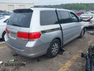 2010 Honda Odyssey EX-L z VIN 5FNRL3H78AB036216, wystawiony jako IAAI lot #42115792 z przebiegiem 234 057 mil mil oraz . Historia ofert i sprzedaży dostępna na DreamBid. Obrazek 4.