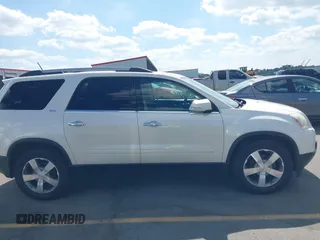 2011 GMC Acadia SLT2 with VIN 1GKKRSED1BJ235224, listed as a IAAI auction lot 42307216 with 158,126 mi miles and . Bid and sale history available at DreamBid. Image 13.