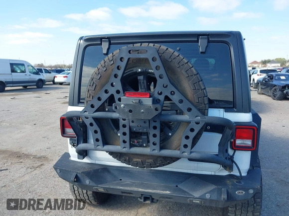 2018 Jeep Wrangler Unlimited Sport S с VIN 1C4HJXDG0JW205803, выставлен на аукционе IAAI как лот 41615097 с пробегом Не указан миль и . История ставок и продаж доступна на DreamBid. Изображение 16.
