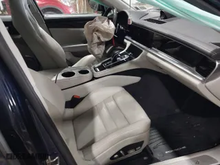 2021 Porsche Panamera with VIN WP0AJ2A78ML121162, listed as a IAAI auction lot 41560345 with 89,775 mi miles. Bid and sale history available at carsss.com. Image 5.