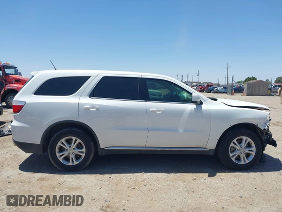 2013 Dodge Durango SXT with VIN 1C4RDHAG0DC696904, listed as a IAAI auction lot 42310831 with 112,964 mi miles and . Bid and sale history available at DreamBid. Image 14.