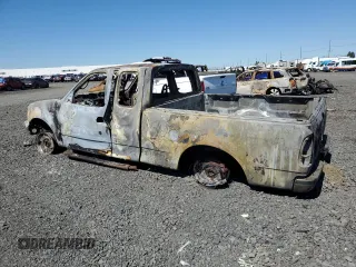 2000 Ford F-150 XL with VIN 1FTRX18L7YNB37250, listed as a Copart auction lot 62401345 with Not provided miles and Salvage title. Bid and sale history available at DreamBid. Image 2.