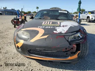 2008 Mazda MX-5 Miata Grand Touring z VIN JM1NC26F780144189, wystawiony jako Copart lot #52204015 z przebiegiem 71 339 mil mil oraz Szkoda całkowita • Salvage title. Historia ofert i sprzedaży dostępna na DreamBid. Obrazek 5.