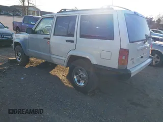 2001 Jeep Cherokee Sport with VIN 1J4FT48S01L528968, listed as a IAAI auction lot 41488259 with 230,482 mi miles. Bid and sale history available at carsss.com. Image 3.