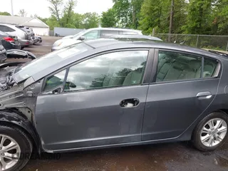 2010 Honda Insight EX with VIN JHMZE2H73AS025856, listed as a IAAI auction lot 42183307 with 71,564 mi miles and . Bid and sale history available at DreamBid. Image 15.