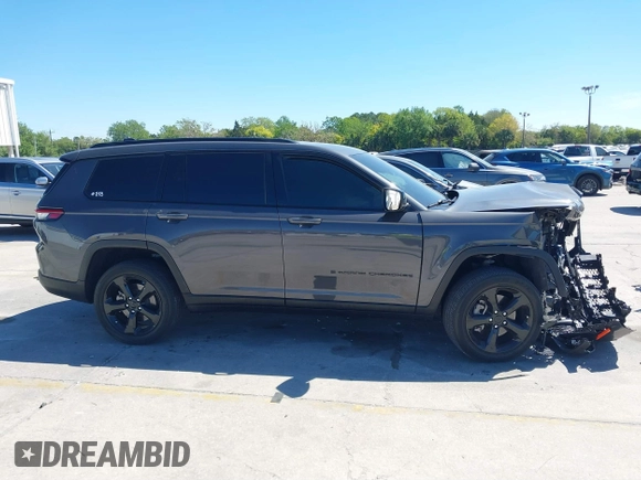 2023 Jeep Grand Cherokee Altitude with VIN 1C4RJJAG0P8814120, listed as a IAAI auction lot 41853023 with 30,313 mi miles and . Bid and sale history available at DreamBid. Image 13.