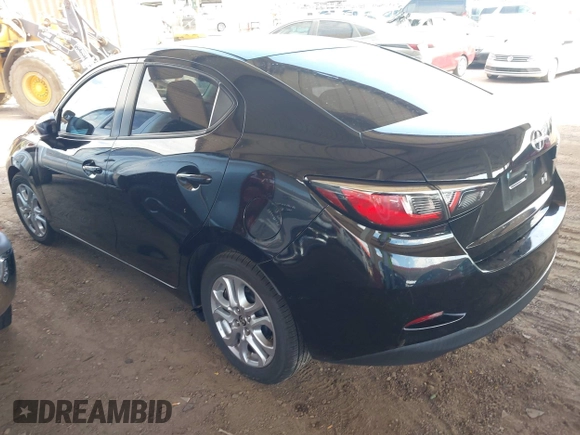 2016 Scion iA z VIN 3MYDLBZV2GY102744, wystawiony jako IAAI lot #42118048 z przebiegiem 128 772 mil mil oraz . Historia ofert i sprzedaży dostępna na DreamBid. Obrazek 3.