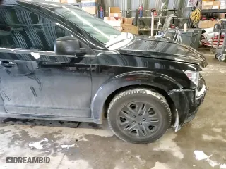 2015 Dodge Journey American Value Pkg with VIN 3C4PDCAB6FT735288, listed as a Copart auction lot 45291265 with 182,612 mi miles and Salvage Title. Bid and sale history available at carsss.com. Image 12.