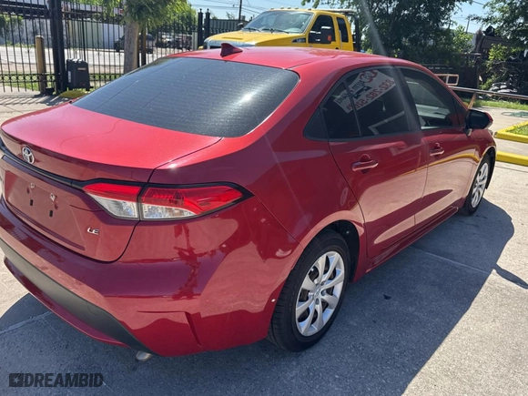 2021 Toyota Corolla LE with VIN JTDEPMAE3MJ132012, listed as a Copart auction lot 52353005 with 27,926 mi miles and Salvage Title. Bid and sale history available at carsss.com. Image 4.