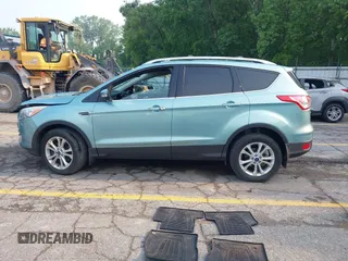 2013 Ford Escape Titanium with VIN 1FMCU9J99DUD63037, listed as a IAAI auction lot 42436605 with 168,200 mi miles and . Bid and sale history available at DreamBid. Image 14.