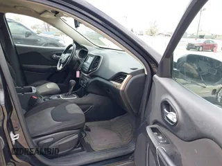 2014 Jeep Cherokee Latitude with VIN 1C4PJLCB6EW186576, listed as a IAAI auction lot 42099422 with 117,681 mi miles and . Bid and sale history available at DreamBid. Image 5.
