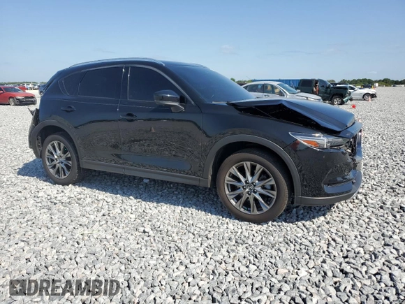 2021 Mazda CX-5 Signature with VIN JM3KFBEY5M0439676, listed as a Copart auction lot 52823285 with 41,811 mi miles and Non Repairable. Bid and sale history available at carsss.com. Image 4.