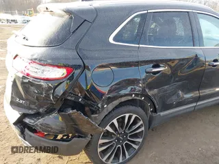 2019 Lincoln MKC Reserve with VIN 5LMTJ3DH1KUL01408, listed as a IAAI auction lot 41396256 with 75,769 mi miles. Bid and sale history available at carsss.com. Image 17.