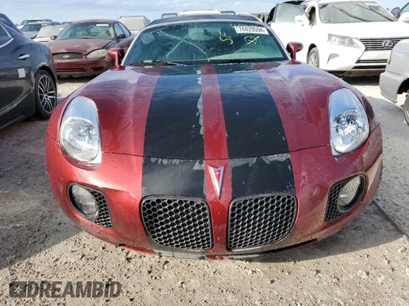 2009 Pontiac Solstice GXP z VIN 1G2MT35X59Y105202, wystawiony jako Copart lot #74429594 z przebiegiem Nie podano mil oraz Szkoda całkowita • Salvage title. Historia ofert i sprzedaży dostępna na DreamBid. Obrazek 5.