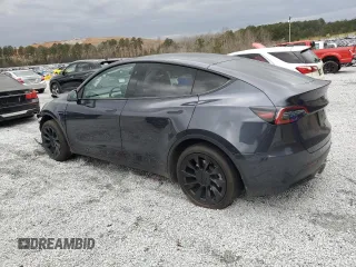 2025 Tesla Model Y Long Range with VIN 7SAYGDED9SA341967, listed as a Copart auction lot 47368695 with 4,310 mi miles and Salvage Title. Bid and sale history available at DreamBid. Image 2.