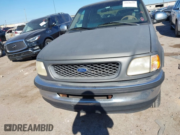 1998 Ford F-150 XL with VIN 1FTRX17LXWKA62592, listed as a IAAI auction lot 41830219 with 172,732 mi miles and . Bid and sale history available at DreamBid. Image 12.