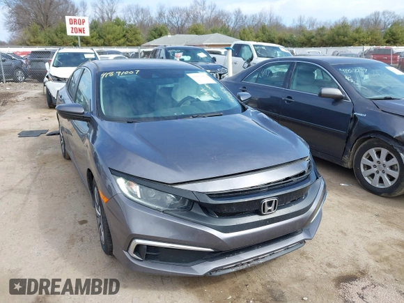 2019 Honda Civic LX with VIN 19XFC2F61KE037495, listed as a IAAI auction lot 41891007 with 90,262 mi miles and . Bid and sale history available at DreamBid. Image 1.