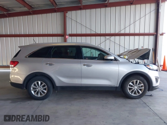 2018 Kia Sorento LX V6 with VIN 5XYPGDA50JG413205, listed as a IAAI auction lot 40331681 with 69,664 mi miles. Bid and sale history available at carsss.com. Image 13.