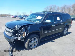 2009 Chevrolet Suburban LTZ with VIN 1GNFK36399J124158, listed as a IAAI auction lot 42063097 with 204,856 mi miles. Bid and sale history available at carsss.com. Image 17.