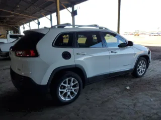 2017 Jeep Cherokee Latitude with VIN 1C4PJLCB7HW619410, listed as a Copart auction lot 49455815 with 142,214 mi miles and Salvage Title. Bid and sale history available at carsss.com. Image 3.
