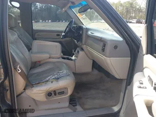 2002 Chevrolet Tahoe LT with VIN 1GNEC13Z92R273473, listed as a IAAI auction lot 41841071 with 290,007 mi miles. Bid and sale history available at carsss.com. Image 5.