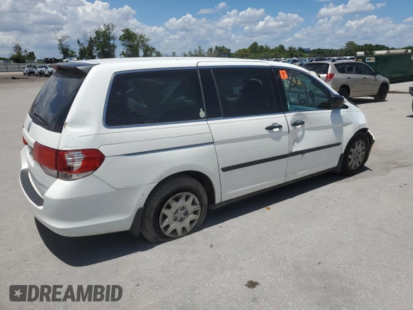 2010 Honda Odyssey LX with VIN 5FNRL3H23AB032112, listed as a Copart auction lot 60876035 with 223,335 mi miles and Salvage title. Bid and sale history available at DreamBid. Image 3.