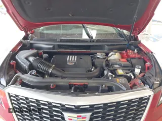2024 Cadillac XT5 FWD Luxury with VIN 1GYKNAR42RZ738679, listed as a IAAI auction lot 42355530 with 14,660 mi miles and . Bid and sale history available at DreamBid. Image 10.