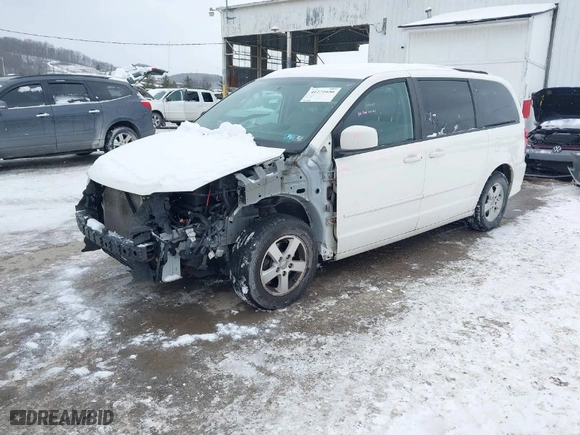 2011 Dodge Grand Caravan Mainstreet with VIN 2D4RN3DG7BR690603, listed as a IAAI auction lot 41271656 with 131,851 mi miles. Bid and sale history available at carsss.com. Image 2.