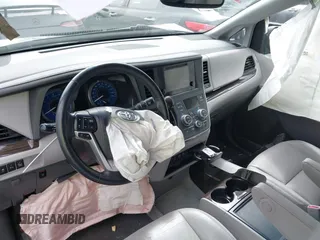 2015 Toyota Sienna XLE with VIN 5TDYK3DC6FS660410, listed as a IAAI auction lot 41801496 with 81,755 mi miles. Bid and sale history available at carsss.com. Image 20.