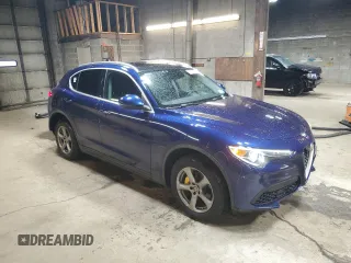 2018 Alfa Romeo Stelvio z VIN ZASFAKAN0J7C04021, wystawiony jako Copart lot #53308355 z przebiegiem 58 192 mil mil oraz Szkoda całkowita • Salvage title. Historia ofert i sprzedaży dostępna na DreamBid. Obrazek 4.