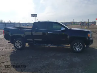 2015 GMC Canyon 4WD SLT with VIN 1GTG6CE34F1153369, listed as a IAAI auction lot 41277810 with 135,821 mi miles. Bid and sale history available at carsss.com. Image 13.