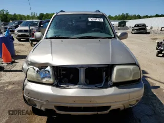 2002 Suzuki XL7 Standard z VIN JS3TY92V524108548, wystawiony jako Copart lot #56304705 z przebiegiem 288 201 mil mil oraz Nie do naprawy • Non repairable. Historia ofert i sprzedaży dostępna na DreamBid. Obrazek 5.